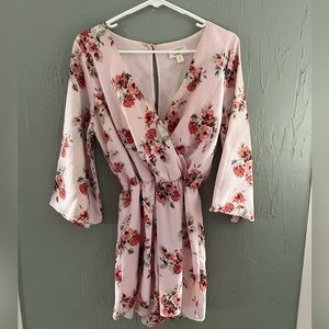 Floral romper with sleeves size medium